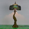 Tiffany-Tischlampe mit mehrfarbigem Glasschirm in Kuppelform und Kunstharzfuß