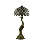 Tiffany-Tischlampe mit mehrfarbigem Glasschirm in Kuppelform und Kunstharzfuß