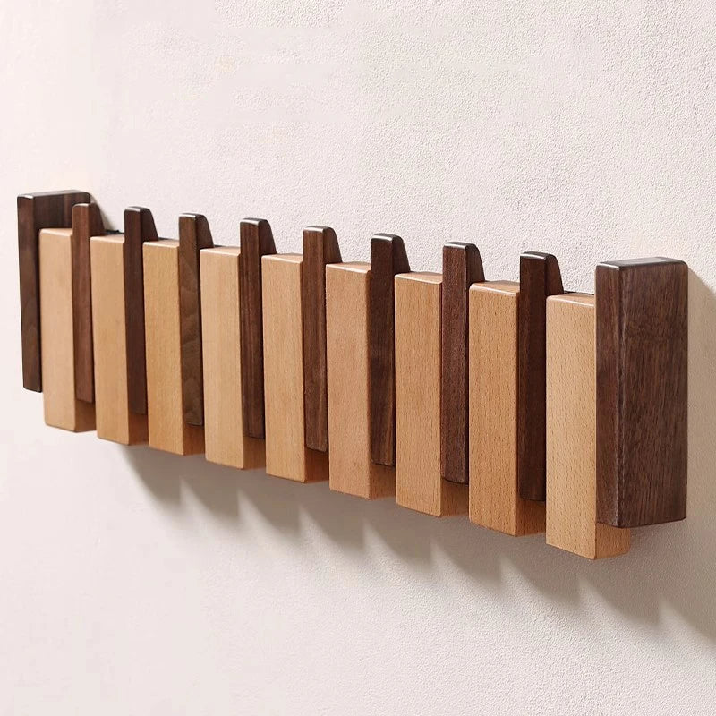 Cabide de parede artesanal Cadenza, ganchos dobráveis em forma de teclas de piano, madeira de nogueira ou faia