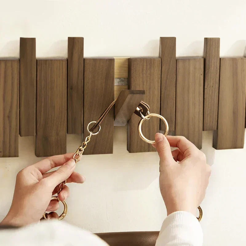LyraWood väggkrokslist, pianoinspirerad design i bok eller valnöt
