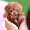 Brinquedo interativo de peluche em forma de cachorro, com cauda que abana e cabeça que se vira