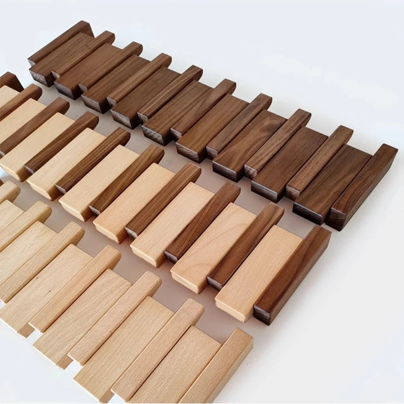Cabide de parede artesanal Cadenza, ganchos dobráveis em forma de teclas de piano, madeira de nogueira ou faia