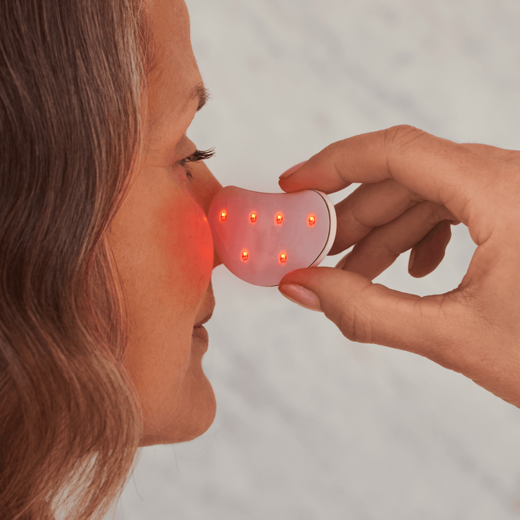 Dispositivo RadianceLift para a zona sob os olhos com luz vermelha e terapia de microcorrentes