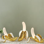 Fantazyjna lampka stołowa w kształcie banana z żywicy w ciepłych odcieniach, BananaShine