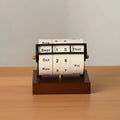 Mid-Century wooden rotary calendar for tasteful desk design - Fioriscas