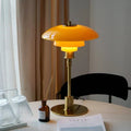 Geometryczna lampka biurkowa z miedzianą podstawą, lampa stołowa Asterin w stylu art déco