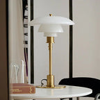 Geometryczna lampka biurkowa z miedzianą podstawą, lampa stołowa Asterin w stylu art déco