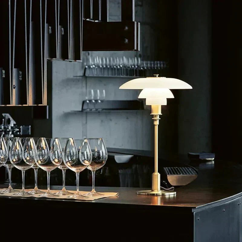 Geometryczna lampka biurkowa z miedzianą podstawą, lampa stołowa Asterin w stylu art déco