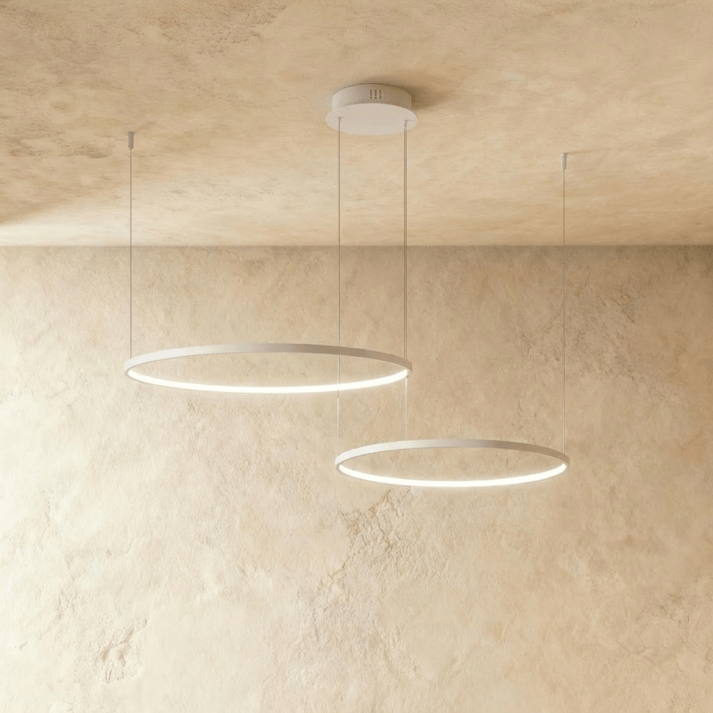 Aurora Circle Chandelier With Soft Halo Lighting Above Dining