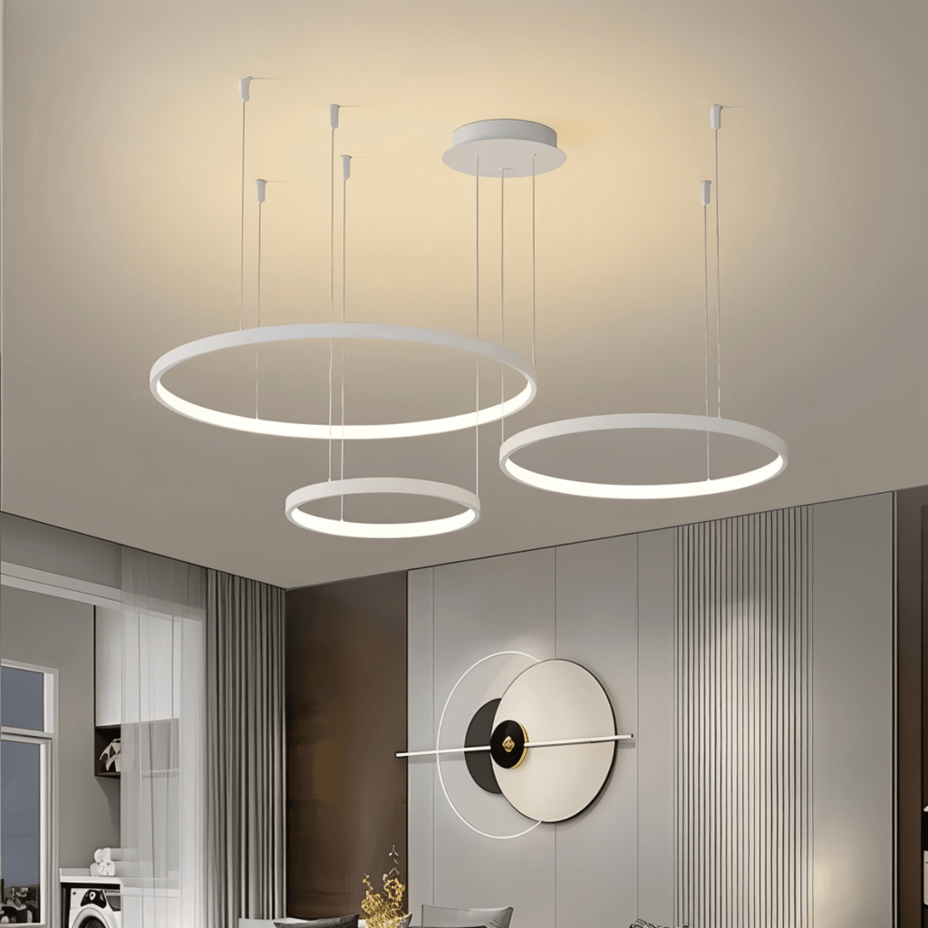 Aurora Circle Chandelier With Soft Halo Lighting Above Dining