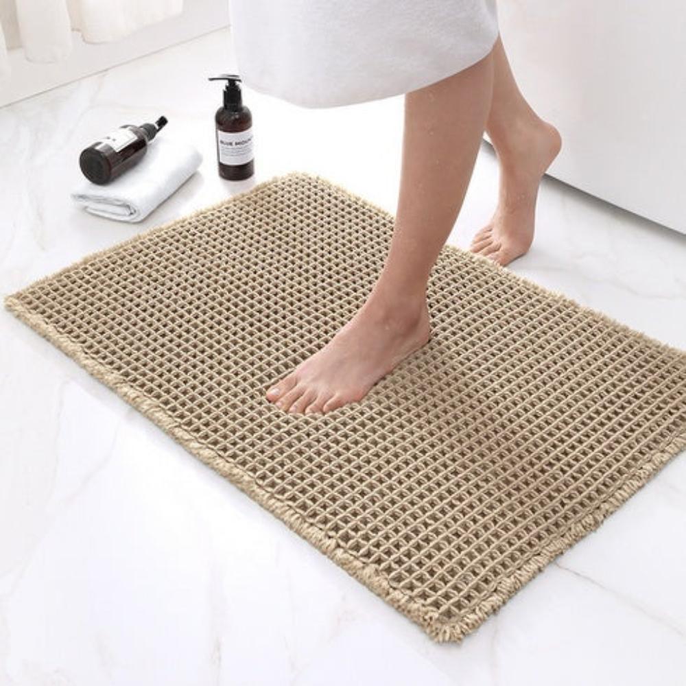 Měkká koupelnová předložka s vaflovou strukturou pro rychlou absorpci vody