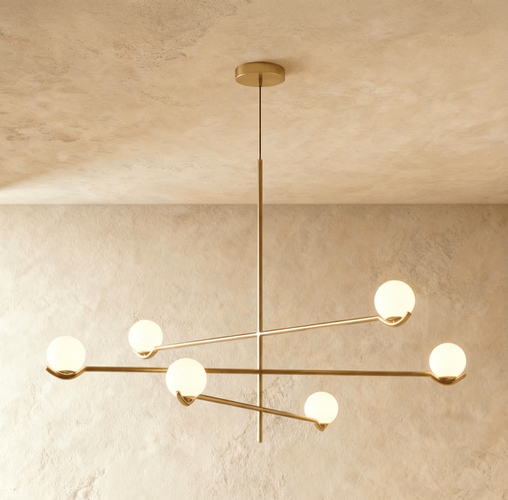 Trio Globe Glass Pendant Light With Slim Iron Rod For Warm Modern Interiors