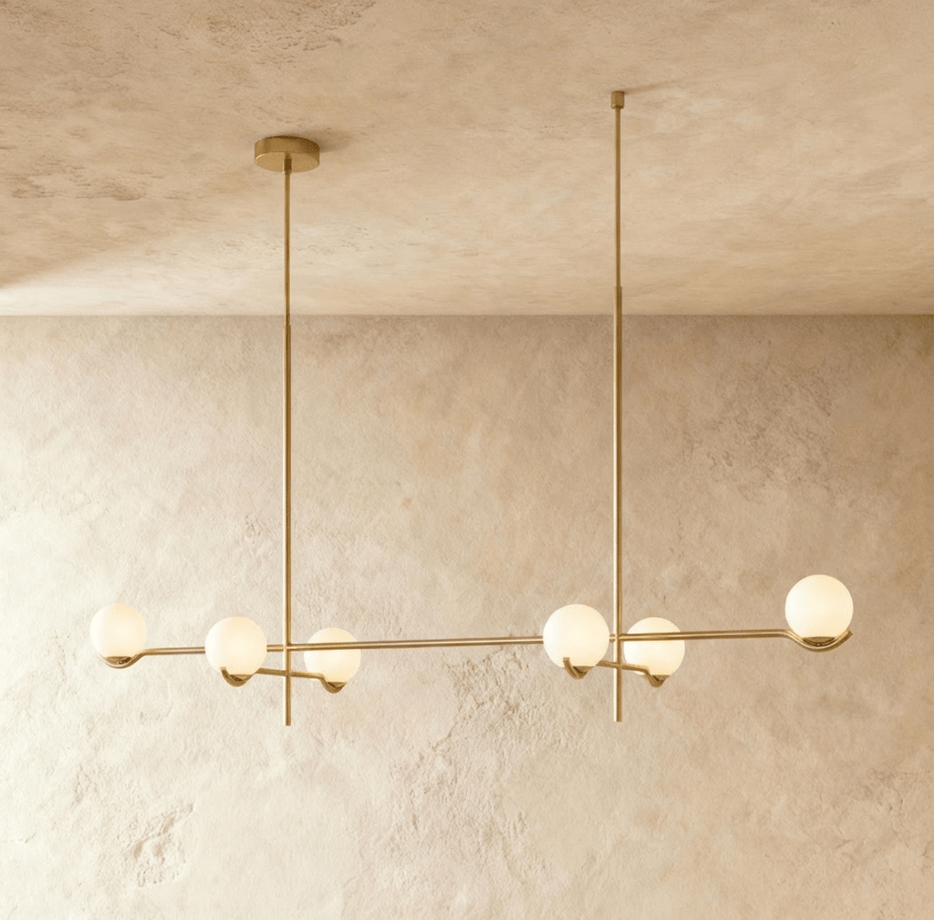 Trio Globe Glass Pendant Light With Slim Iron Rod For Warm Modern Interiors
