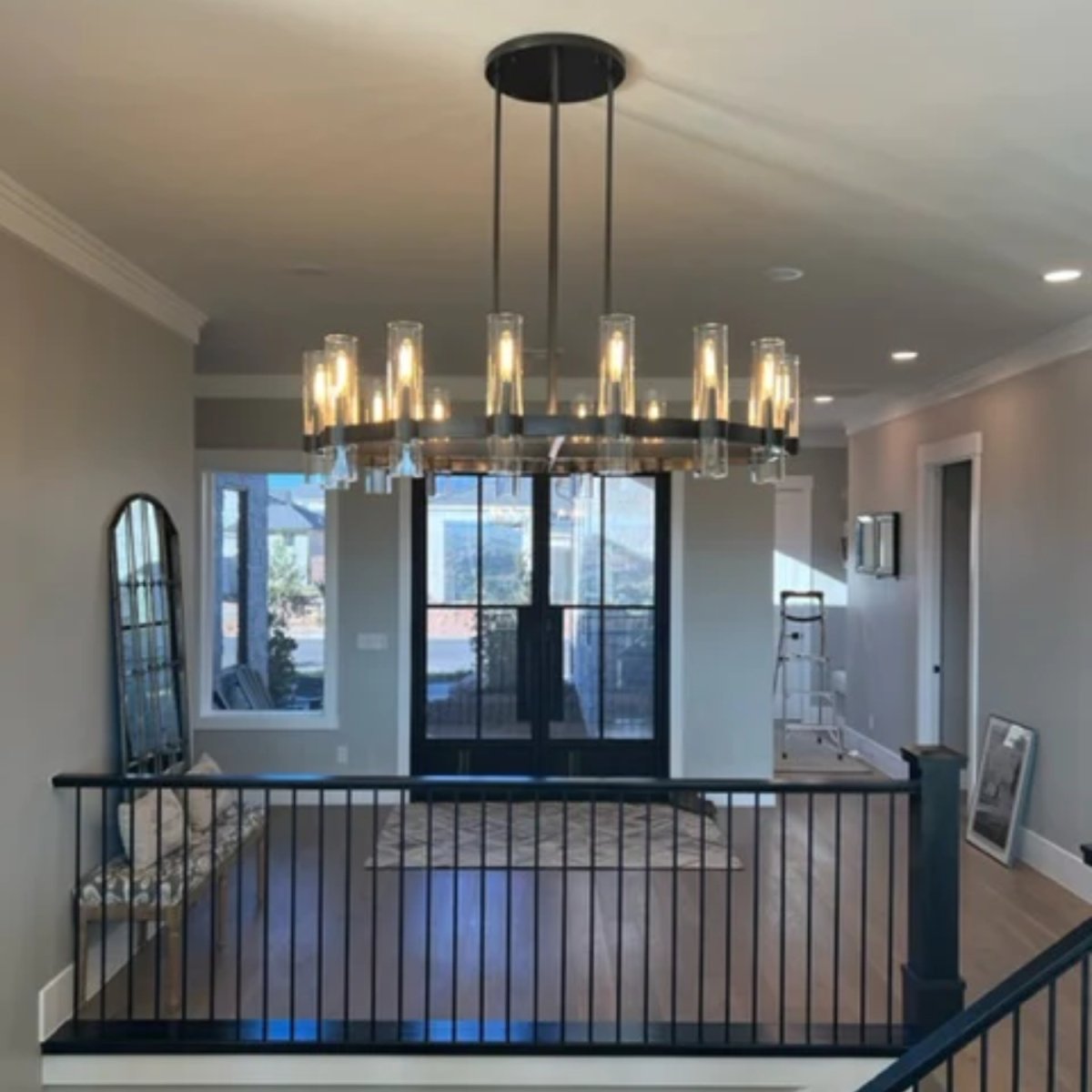 AuroraCurve Glass And Metal Chandelier With Soft Industrial Glow