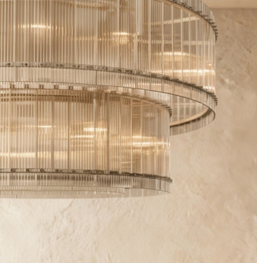 Lumora Two Tier Glass Chandelier With Hand Raked Panels And Soft Glow