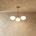 Aurora Gold Iron And Glass Pendant Light With Spherical Glass Shades For Living Rooms